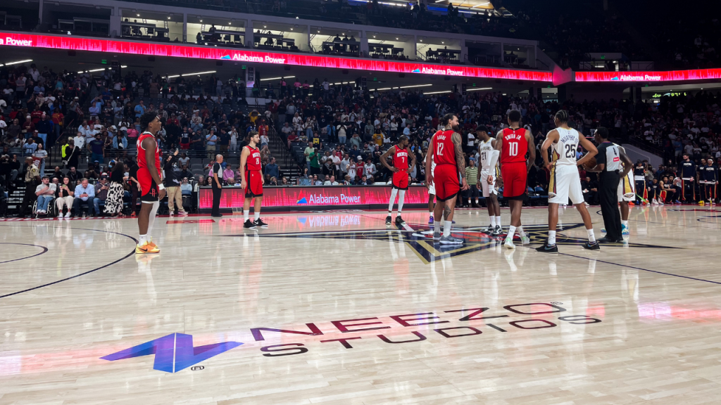 NEEZO Studios logo on court during NBA New Orleans Pelicans vs Houston Rockets game in Birmingham, Alabama