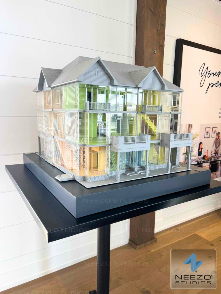 Custom architectural scale model created by NEEZO Studios for Mattamy Homes, featuring transparent color-coded stacked townhome units.