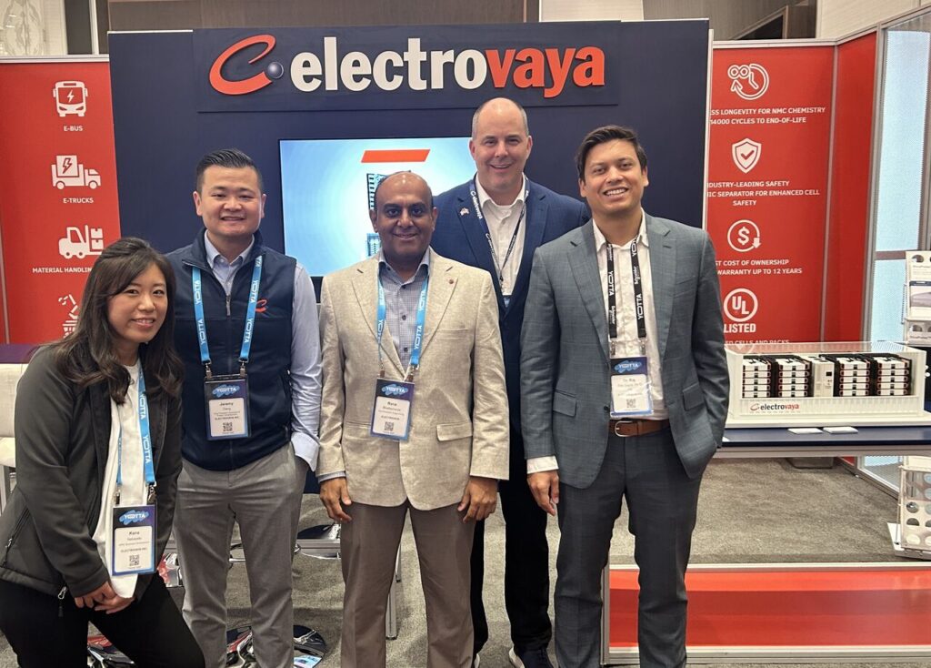 Electrovaya team with custom manufacturing scale model created by NEEZO Studios on display at Yotta 2026